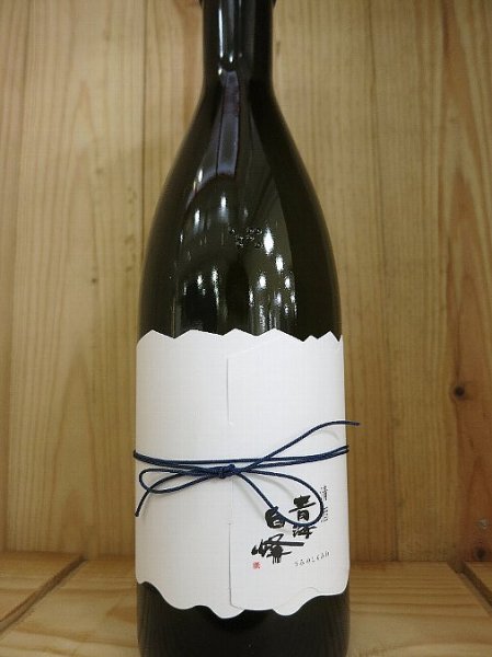 紐が巻いてあります。紐を解くと北アルプス立山連峰が!?